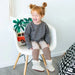 Toddler’s Ragg Wool Booties in grey on a child