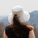 Pistil Women's Leigh Sun Hat in ivory, on model back view