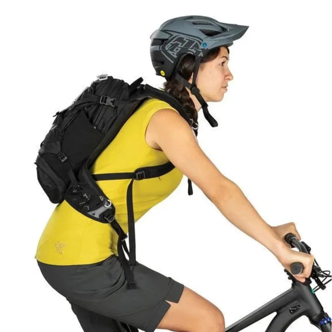 Rider displaying the Osprey Raven 14 backpack attached to her back.
