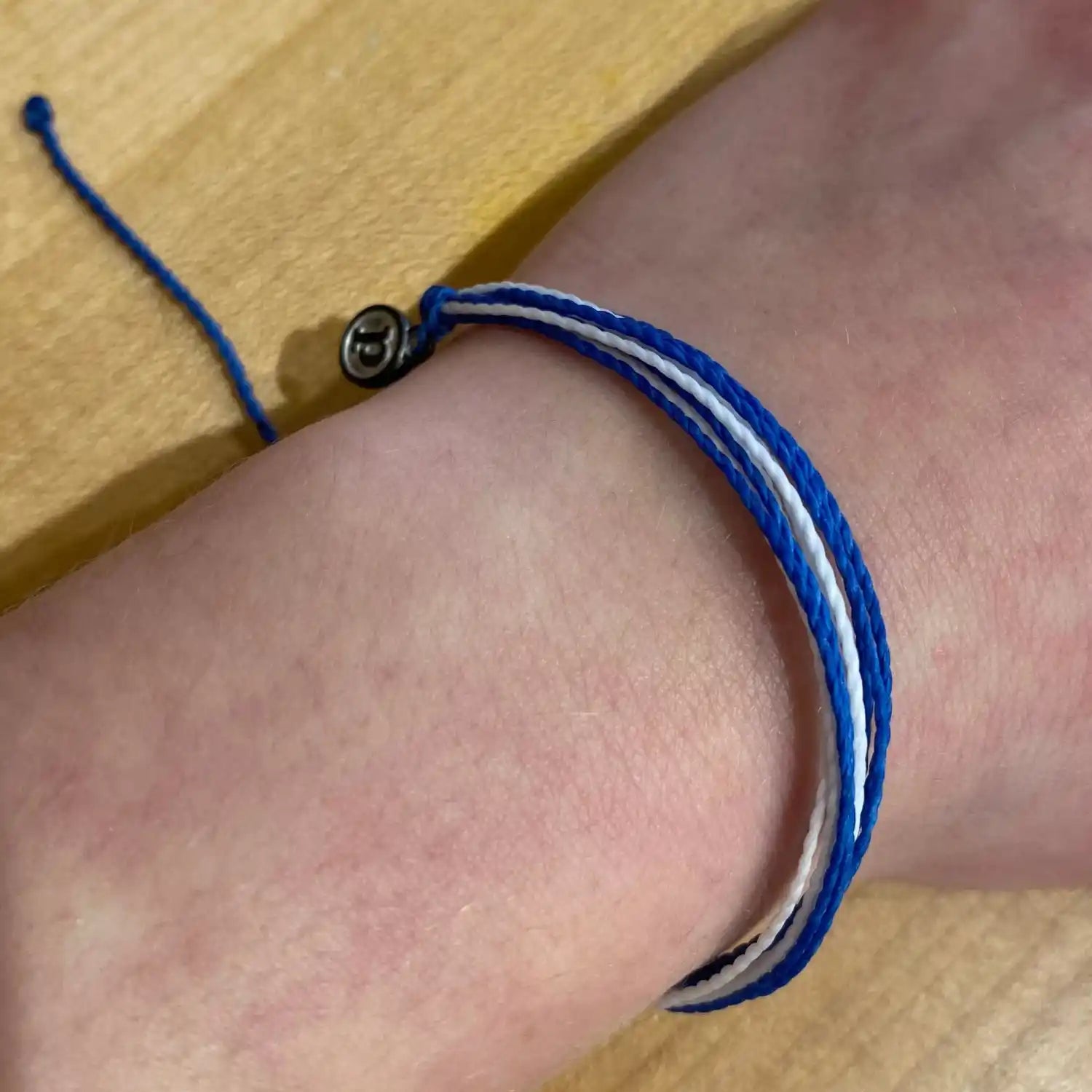 Pura Vida Original Bracelet in blue & white, view on model 