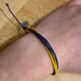 Pura Vida Original Bracelet in blue & yellow, view on model 