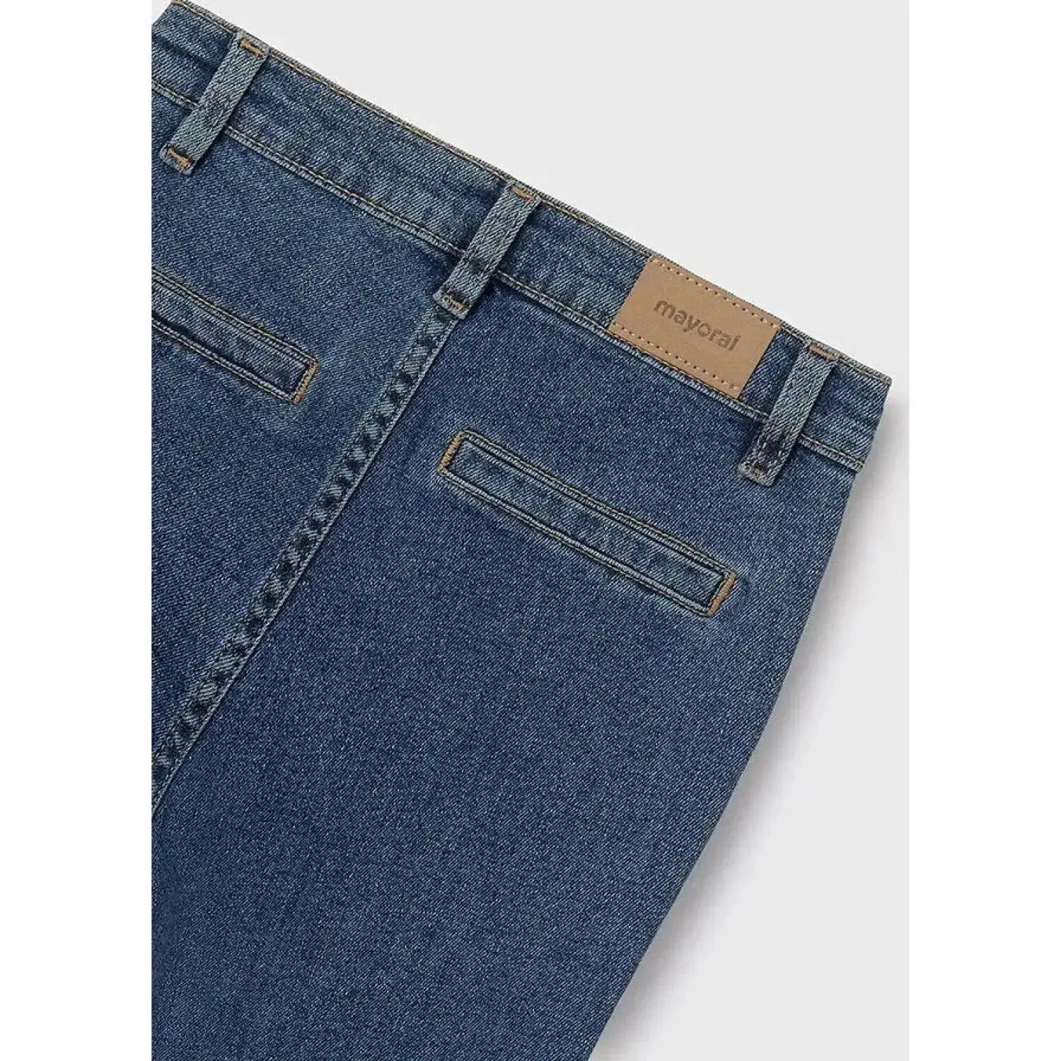 Mayoral Girl's Color Gradient Jeans shown in the Medium Jeans color option. Back Pocket view. 