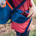 Gregory Youth Wander 50L Backpacking Bag in blue, hip belt pocket detail view
