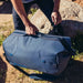 Gregory Alpaca Wide Mouth Duffel 50L in slate blue, lifestyle grab handle detail