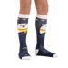 Darn Tough Kid's Polar Bear Over-the-Calf Midweight Ski & Snowboard Socks in blue, on model