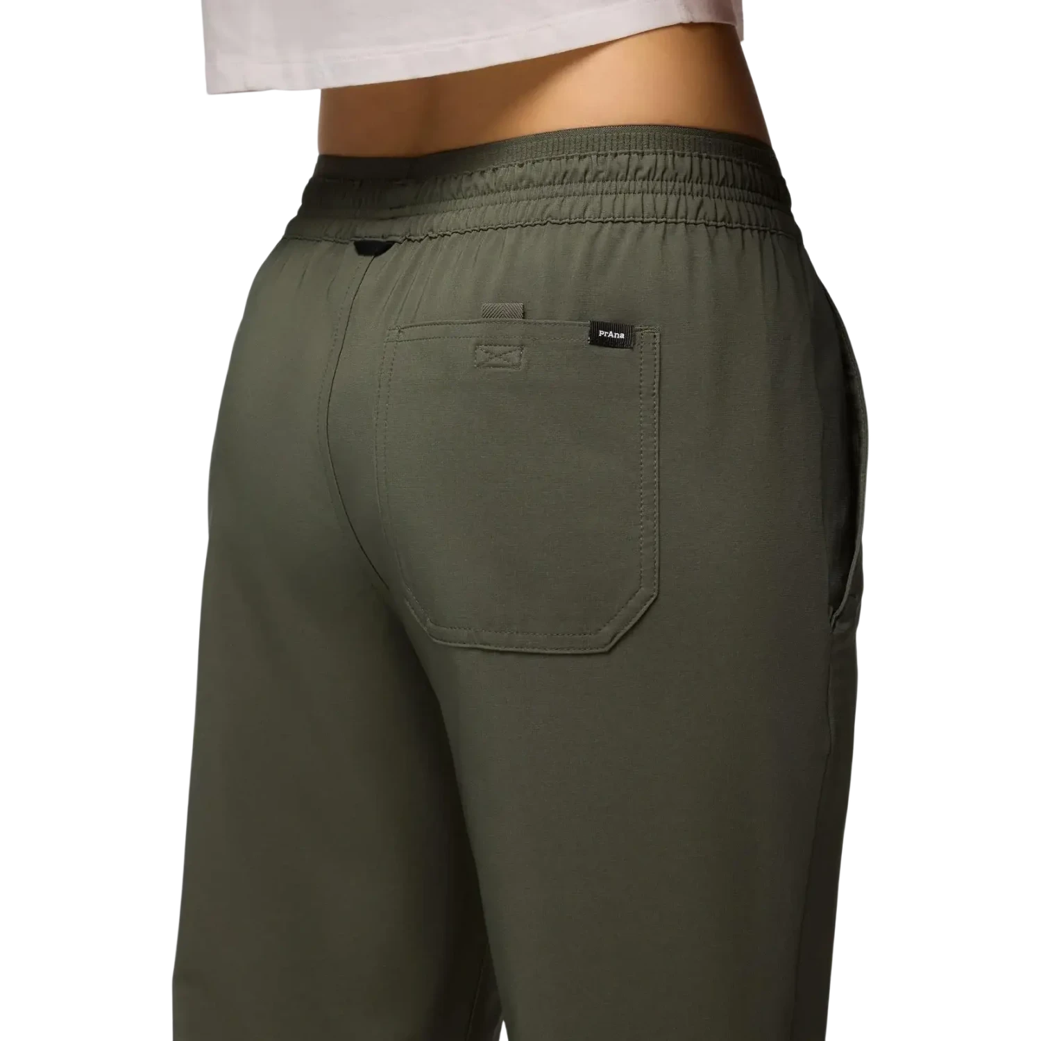 PrAna Women's Wonderland Rocks E-Waist Jogger in spruce, on model back pocket detail view