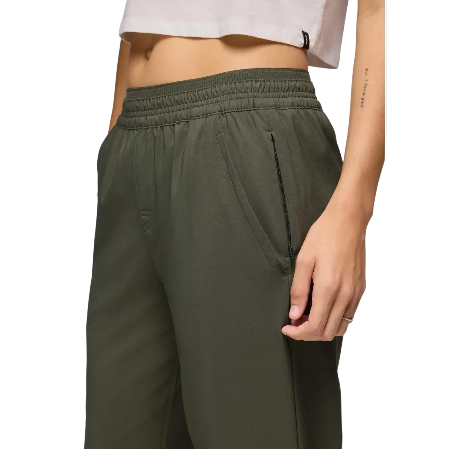 PrAna Women's Wonderland Rocks E-Waist Jogger in spruce, on model front pocket detail view