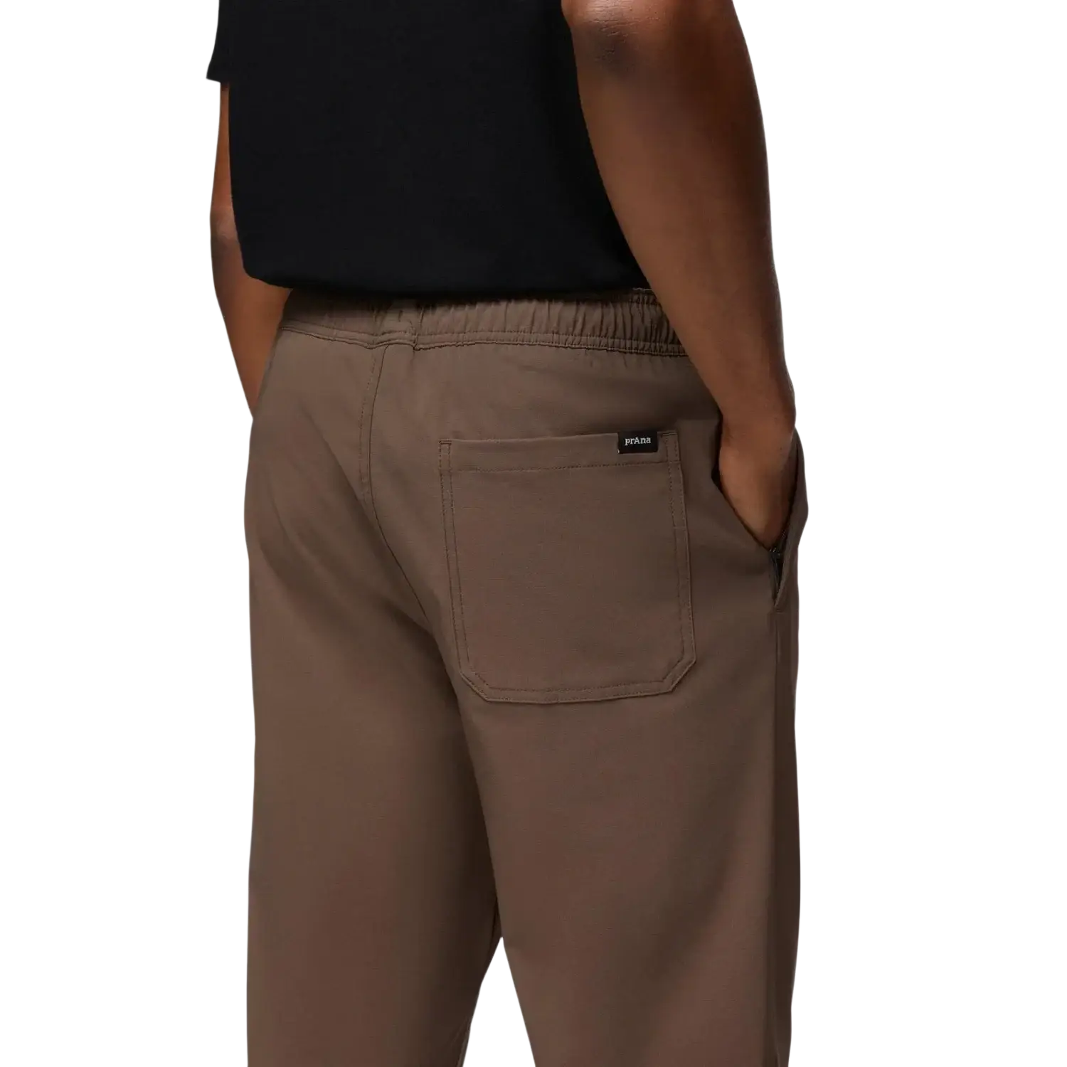 PrAna Men's Wonderland Rocks Pull-On Pant in mud, on model pockets detail view