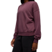 PrAna Women's Cozy Up Crew Sweatshirt in vino, on model front detail view