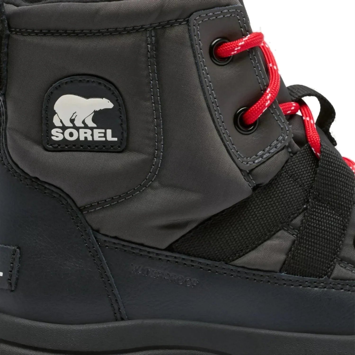 Sorel Kid's Whitney III Mid WP Winter Boot in jet black, detail view