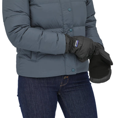 Patagonia Nano Puff™ Mitts in black, on model