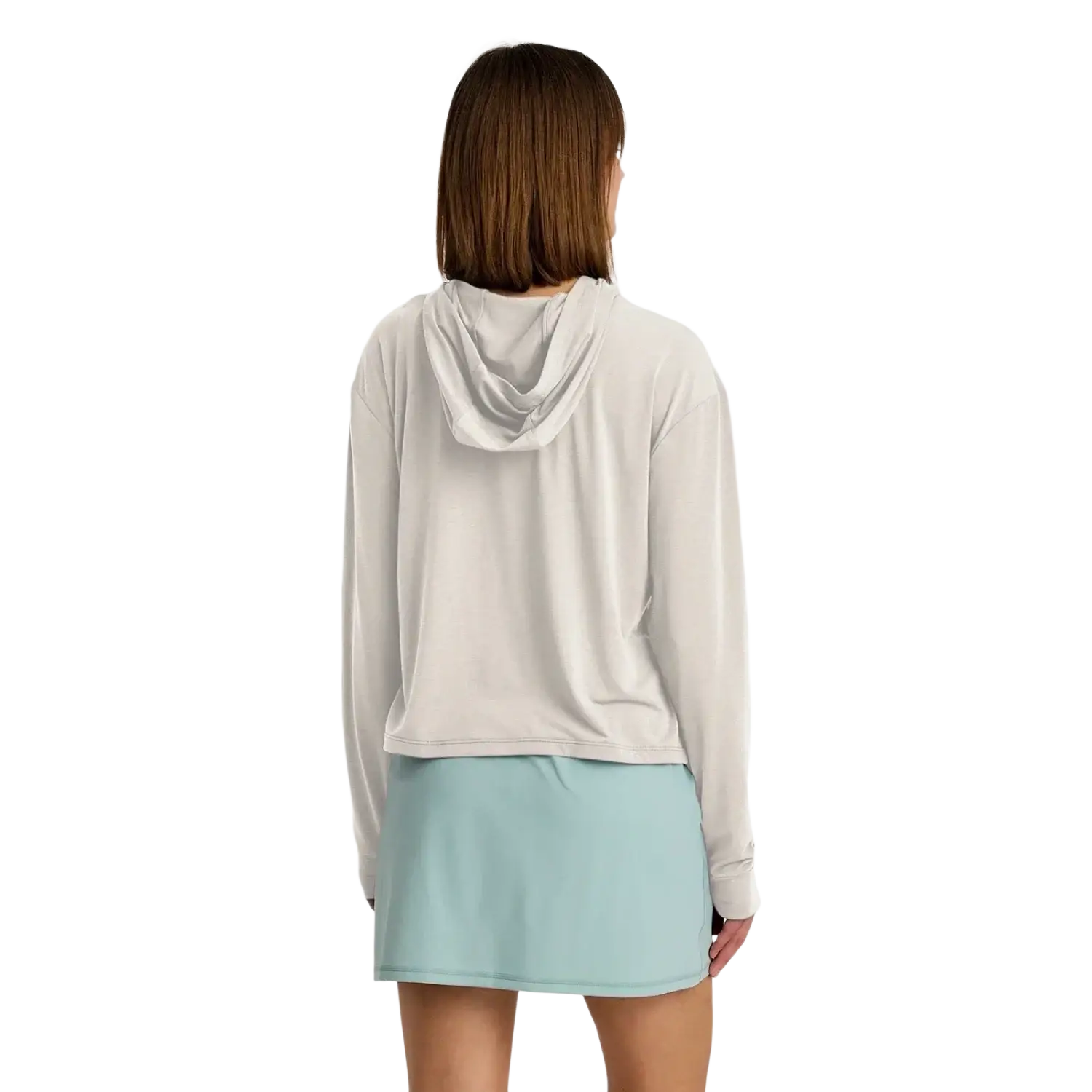 Free Fly Apparel Women's Elevate Lightweight Hoodie in heather birch, on model back view