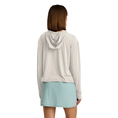 Free Fly Apparel Women's Elevate Lightweight Hoodie in heather birch, on model back view