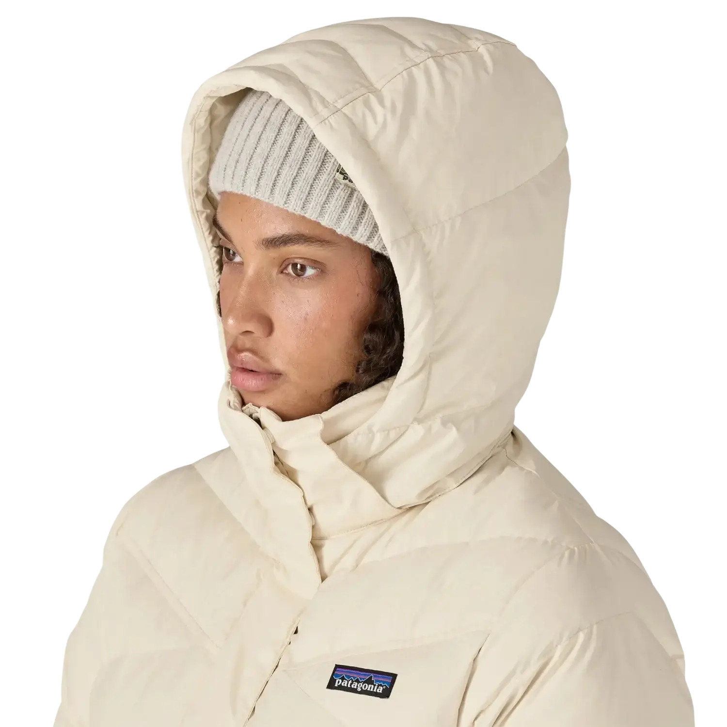 Patagonia Women's Down With It Parka in natural, on model hood up