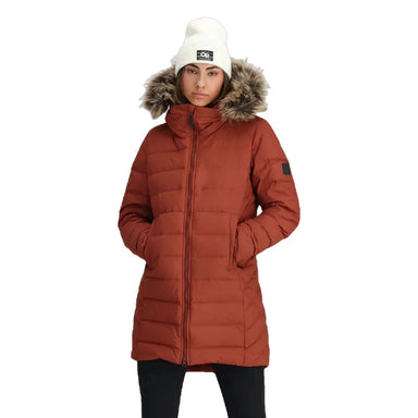 Outdoor Research Women's Coze Lux Down Parka in Brick. A mid-length puffer jacket in a dark orange with a faux fur collar. Front View.