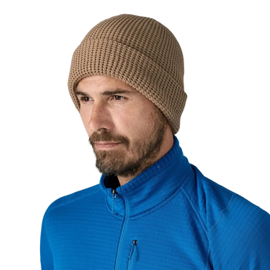 Patagonia SnowDrifter Beanie in slab khaki, on model front view
