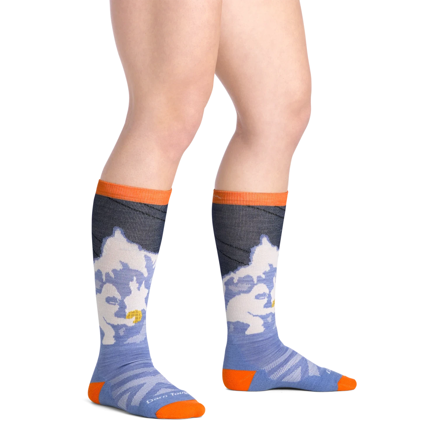 Darn Tough Kid's Little Yeti Over-the-Calf Midweight Ski & Snowboard Socks in midnight, model view