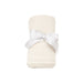 Angel Dear Baby Waffle Swaddle Blanket in basic sugar swizzle, rolled up with bow