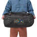 Patagonia Black Hole® Duffel Bag 55L in unity text ink black, held by model