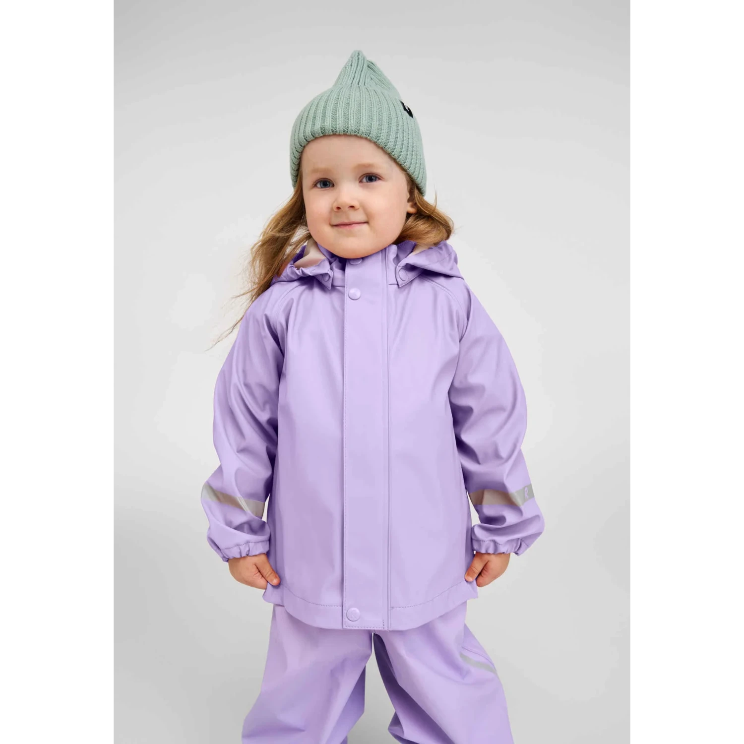Reima Kid's Lampi Rubber Rain Jacket in booming lilac, model front view