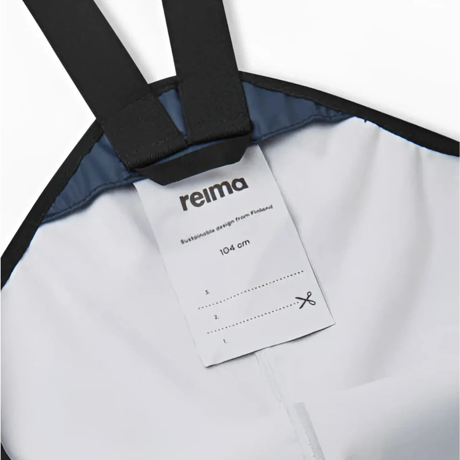 Reima Toddler's Lammikko Rubber Rain Pants in navy, back tag detail