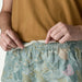 Patagonia Women's Baggies™ Shorts - 5" in moon tripper & virtually blue, on model front tie view