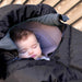 7am Enfant Car Seat Cocoon in black, lifestyle