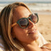 Blue Planet Andiz Polarized Sunglasses in hunter green & zebra wood, on model view