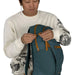 Osprey Daylite Plus 20L in torrent blue, compression straps view