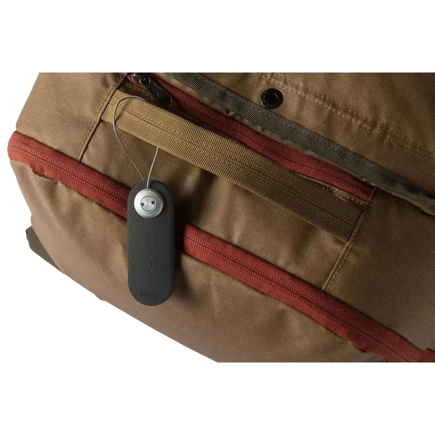 Eagle Creek Knog Scout Travel Smart Luggage Tag in Black, view of tag attached to bag