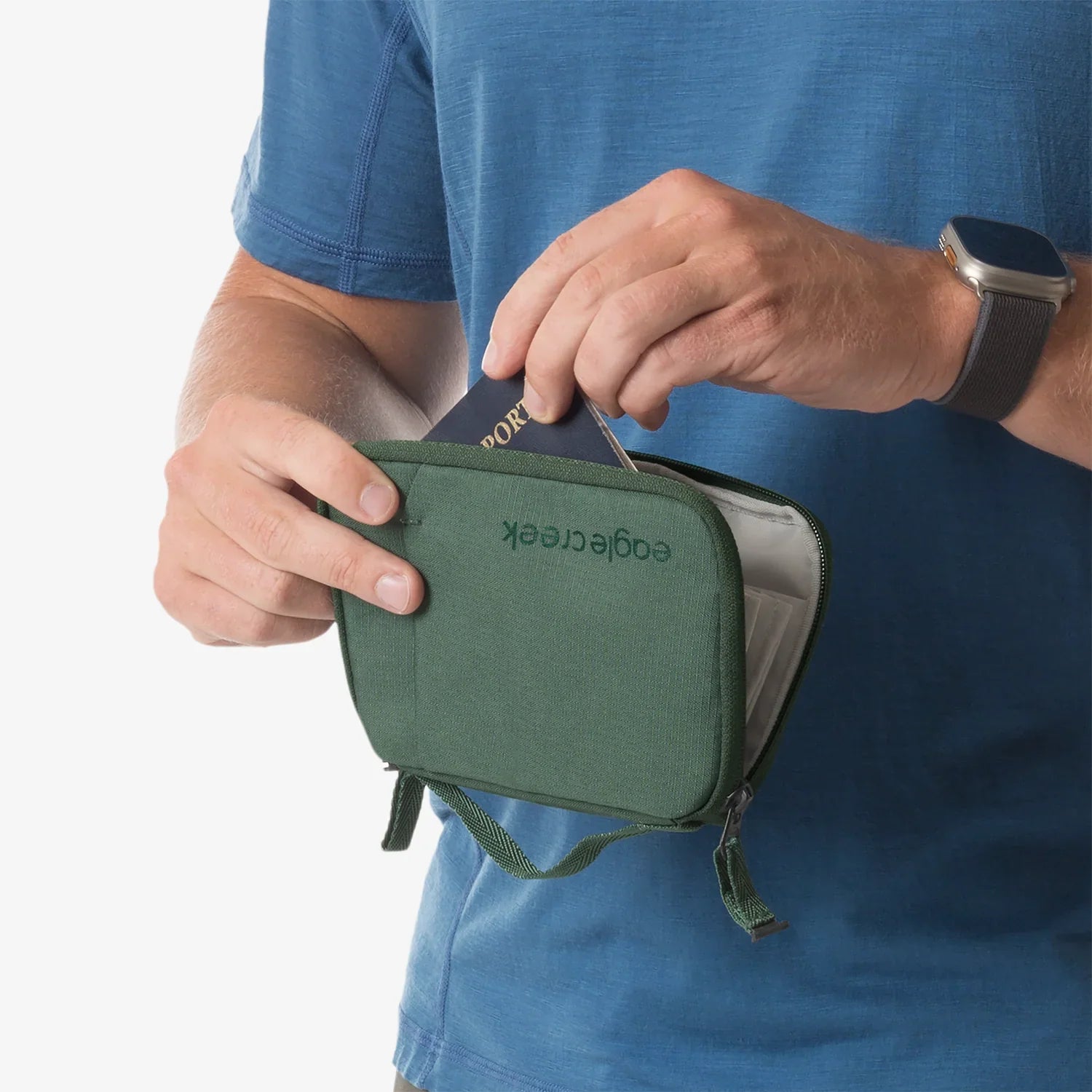 Eagle Creek Stash RFID Passport Wallet in grass green, model view
