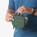 Eagle Creek Stash RFID Passport Wallet in grass green, model view