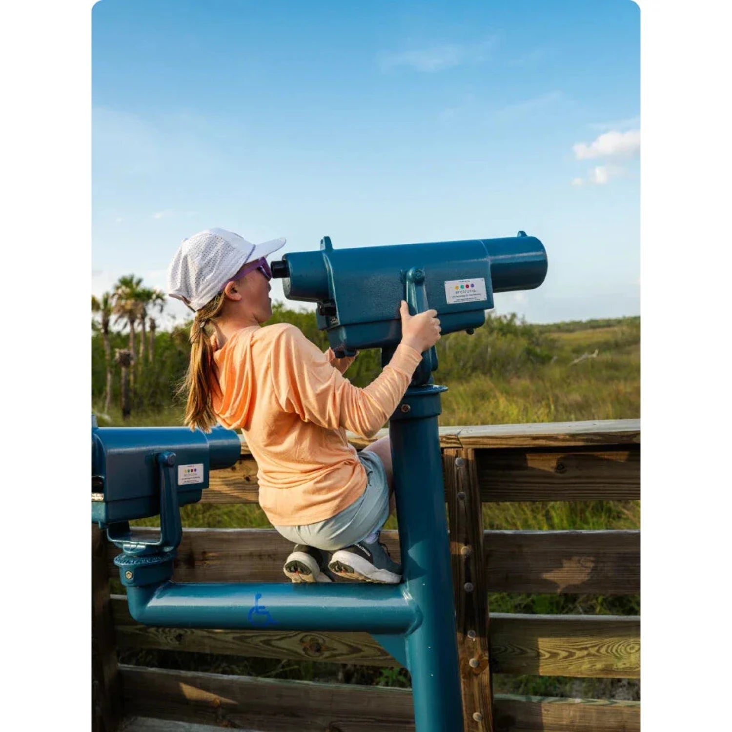 Free Fly K's Bamboo Shade Hoodie in Tropic Orange, back view on model 
