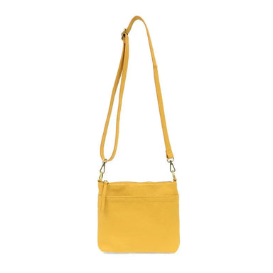 Layla Top Zip Crossbody Bag in Sunflower Yellow. Shown with the strap extended to use as a crossbody bag. Front View.