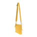 Layla Top Zip Crossbody Bag in Sunflower Yellow. Shown with the strap extended to use as a crossbody bag. Side View.