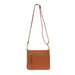 Layla Top Zip Crossbody Bag in Bourbon. Shown with the strap extended to use as a crossbody bag. Back View.