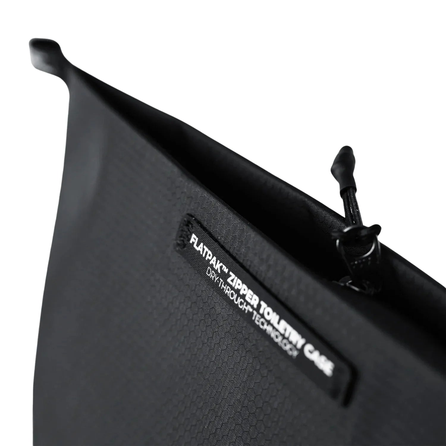 Matador's zippered toiletry case showing the zipper pull and detail.