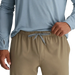 Free Fly Men's Breeze Pant in dark khaki, on model front tie view