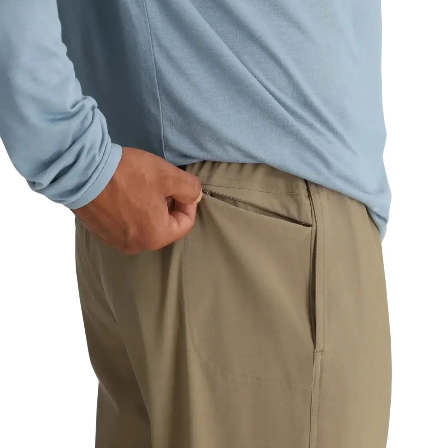Free Fly Men's Breeze Pant in dark khaki, on model side pocket view
