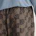 Free Fly Men's Reverb Short in scallop print, on model back pocket detail