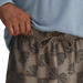 Free Fly Men's Reverb Short in scallop print, on model tie detail