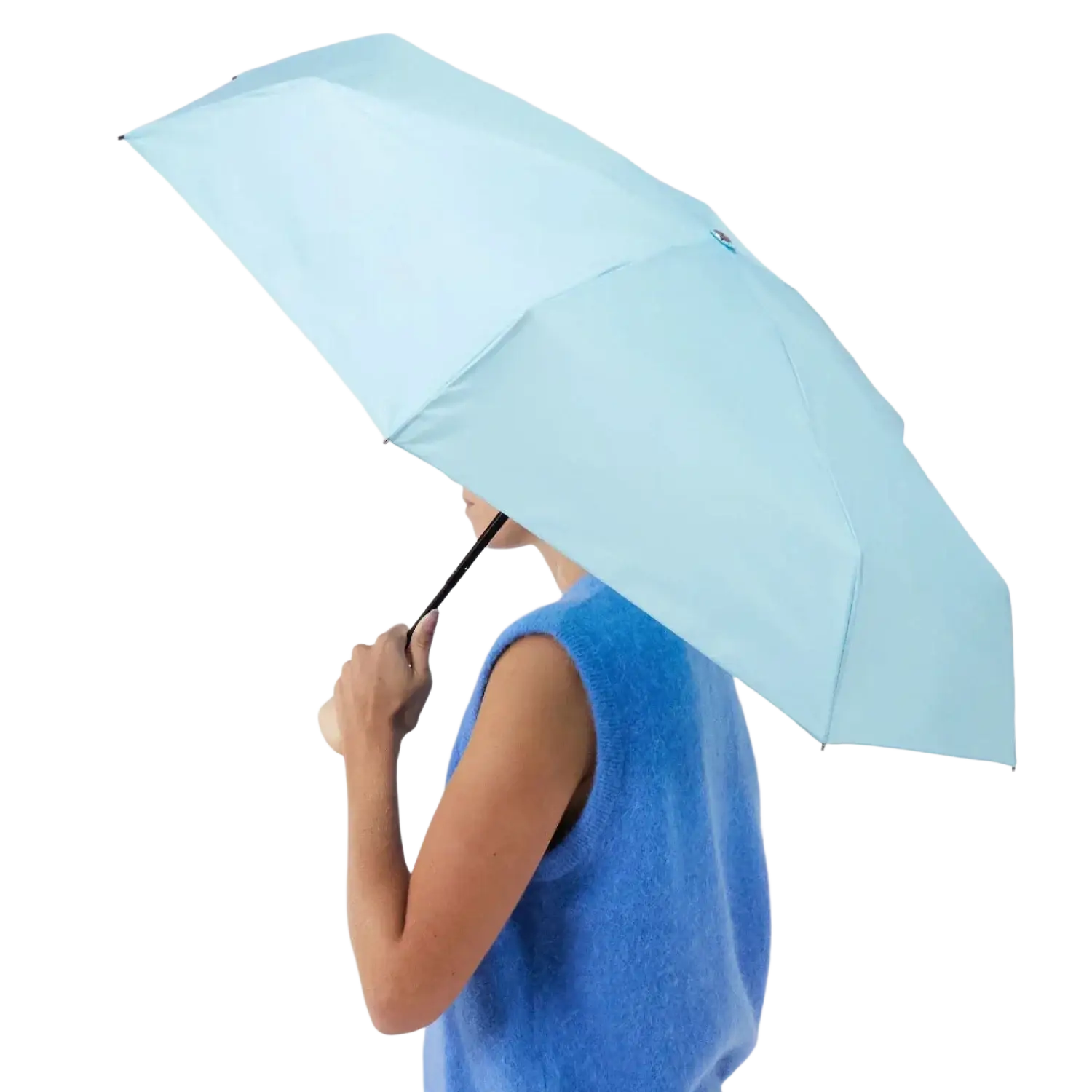 Original Duckhead Ultra Compact Mini Umbrella in popsicle blue, held by model view