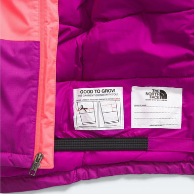 The North Face Kid’s Freedom Insulated Jacket in radiant poppy, good to grow tag inner detail