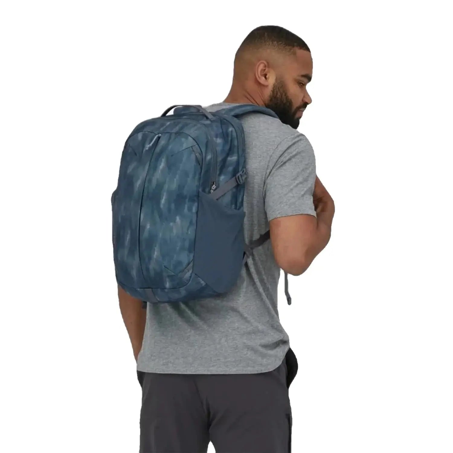Patagonia refugio daypack 26L, agave plume grey, back view on model