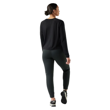 Smartwool Women's Active Fleece Wind Pant in black, on model back view