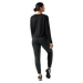 Smartwool Women's Active Fleece Wind Pant in black, on model back view