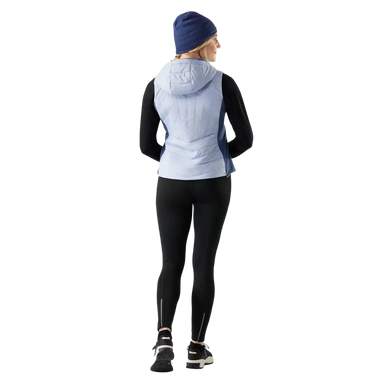 Smartwool Women's Smartloft Vest in icy nightfall blue, on model back view
