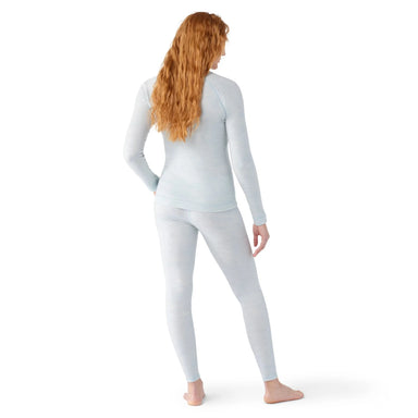 Smartwool Women's Classic Thermal Merino Base Layer Crew in winter sky heather, on model back