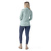 Smartwool Women's Thermal Merino Rib Turtleneck in arctic green heather, on model back