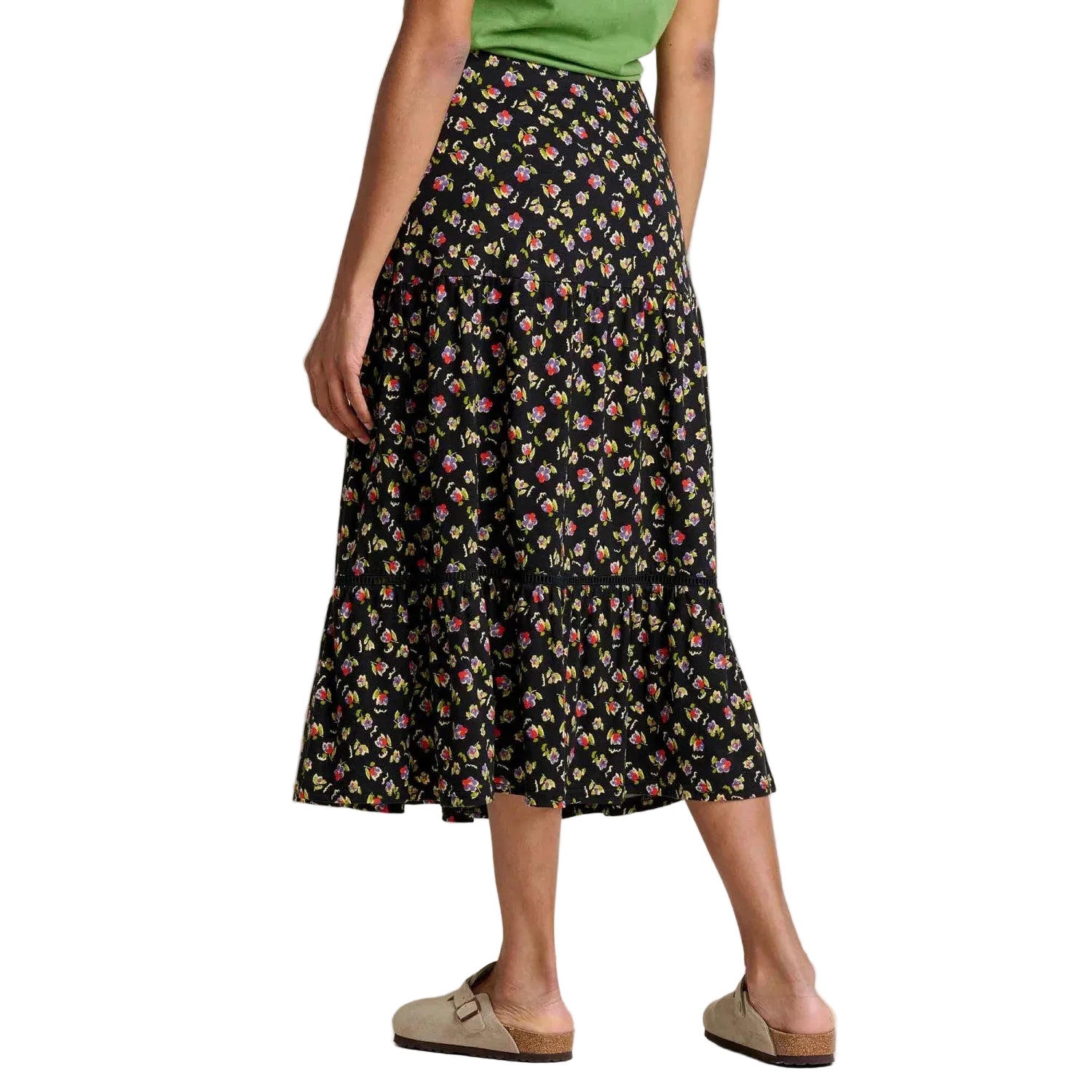 Toad & Co Women's Marigold Tiered Midi Skirt in black pansy print, on model back